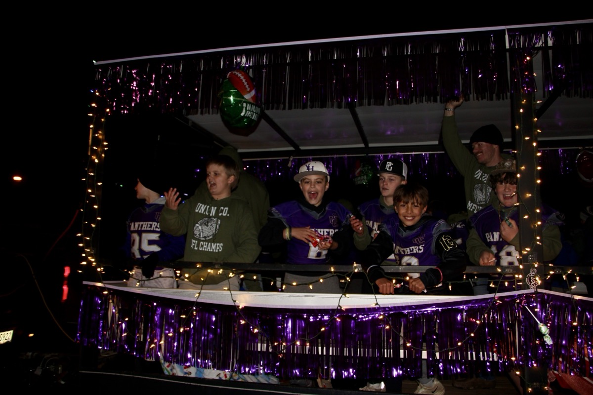The Union County Fifth Grade Football Team celebrated its recent Mountain Athletic Conference Super Bowl victory with a float in Saturday’s Christmas parade. Photo by Shawn Jarrard