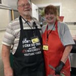 Thanksgiving Blessings volunteers Darwin Lindsey and Chaylene Hebert always have a great time giving back to their community with Thanksgiving dinner. Photo by Samantha Laratta