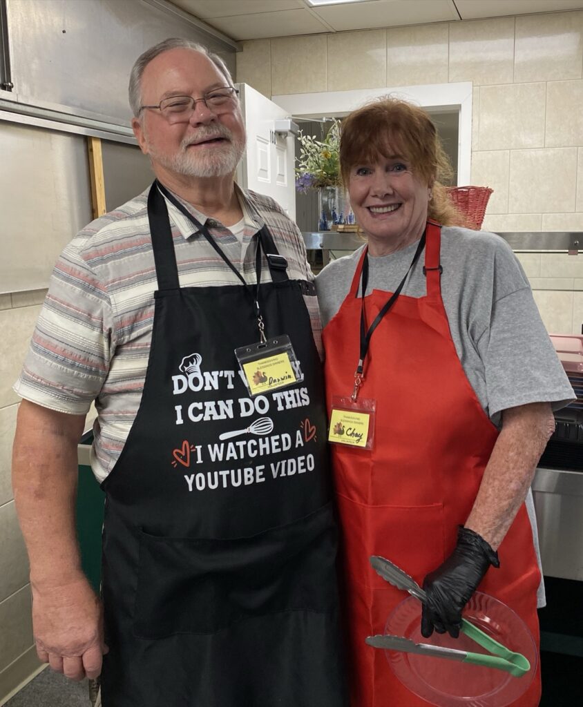 Thanksgiving Blessings volunteers Darwin Lindsey and Chaylene Hebert always have a great time giving back to their community with Thanksgiving dinner. Photo by Samantha Laratta