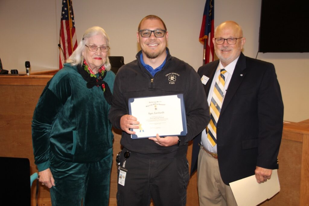 (L-R) Resident Kendra King, Paramedic Ryan Earnheart and local SAR President Jared Ogden joined for Earnheart to receive the prestigious Murray S. King Award and Scholarship Dec. 16. Photo by Shawn Jarrard