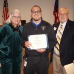 (L-R) Resident Kendra King, Paramedic Ryan Earnheart and local SAR President Jared Ogden joined for Earnheart to receive the prestigious Murray S. King Award and Scholarship Dec. 16. Photo by Shawn Jarrard