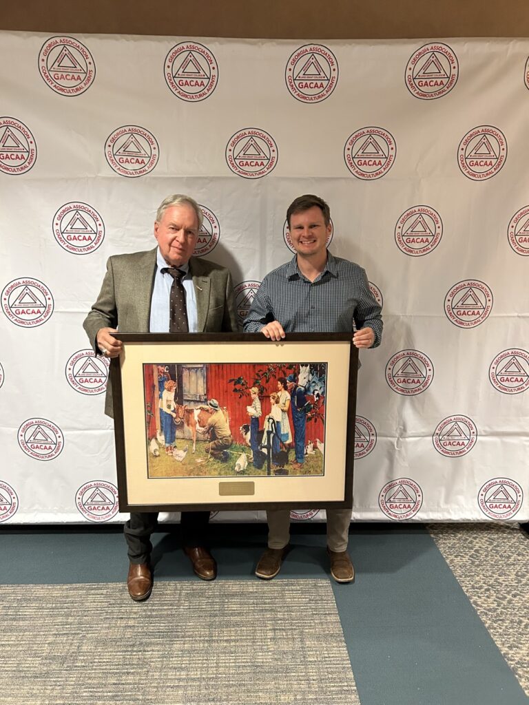 Chest-Chatt RC&D Director Frank Riley and County Agent Jacob Williams in Columbus last month for Riley’s award presentation. Photo/Submitted