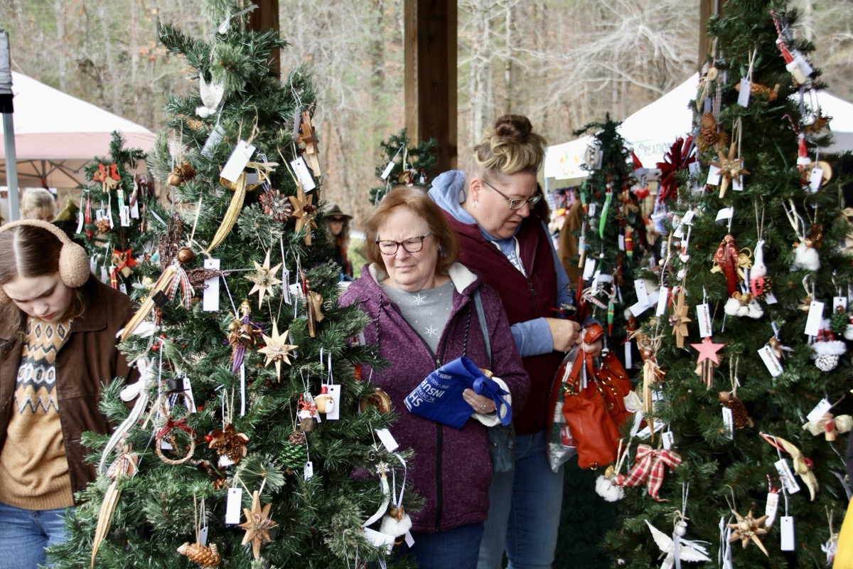 TUMGA’s handmade ornaments were wildly popular at the Kris Kringle Market Saturday. Photo by Shawn Jarrard