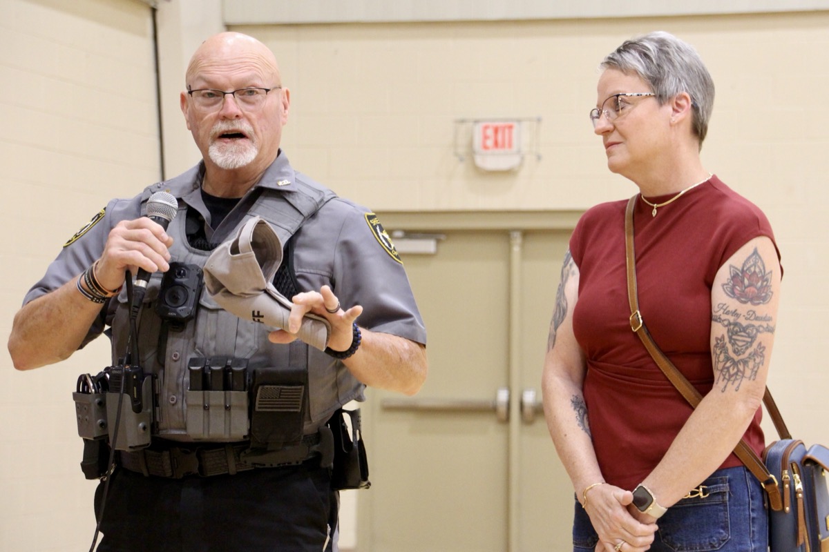 At the Aug. 20 county meeting, UCSO Deputy Buck Stover recounted some of the lifesaving medical care he received from local first responders, with wife Kim looking on. Photo by Shawn Jarrard