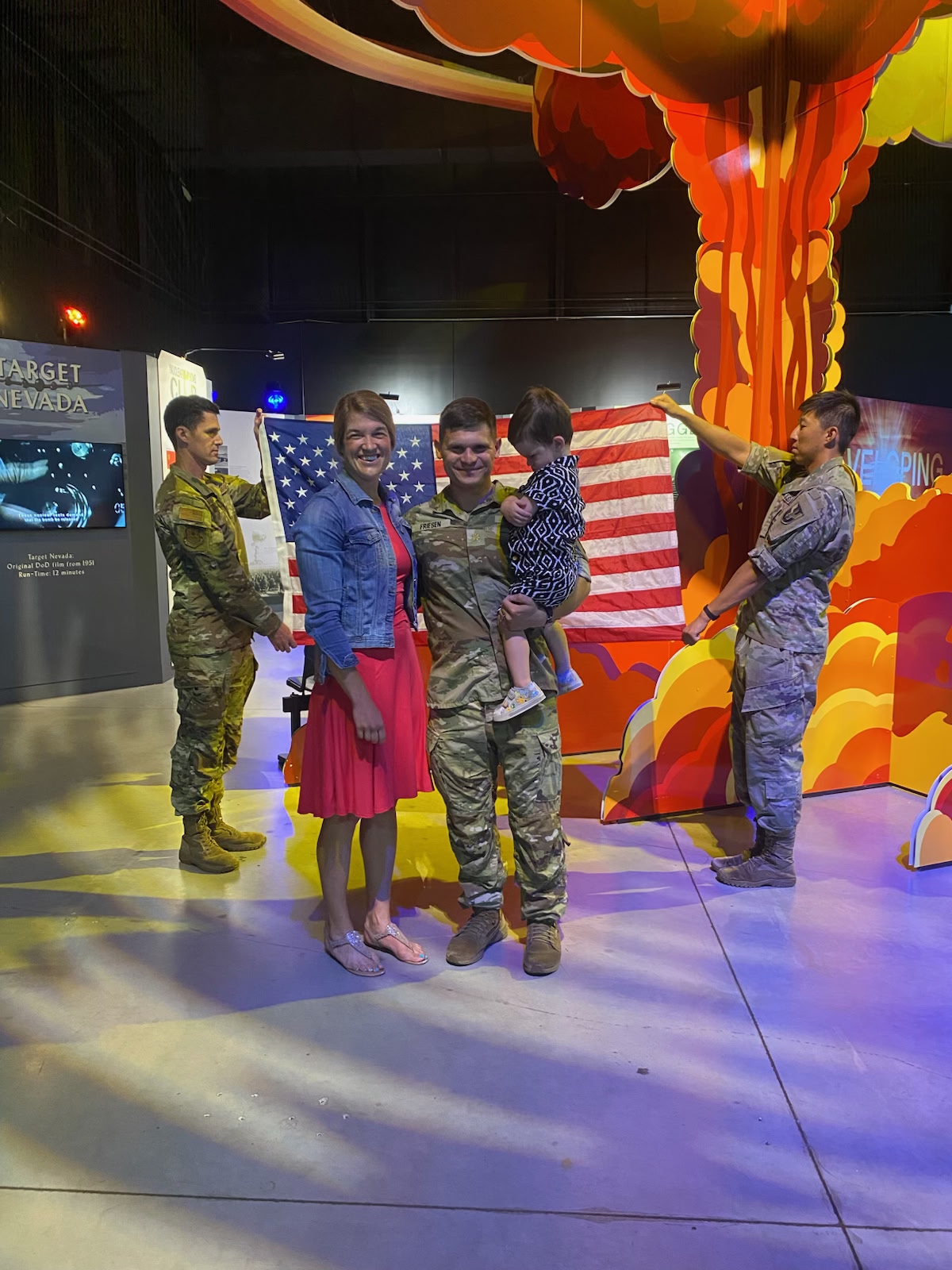 Maj. Andy Friesen, center, with wife Ashley and son. His promotion to U.S. Army Major went into effect July 1. Photo/Submitted