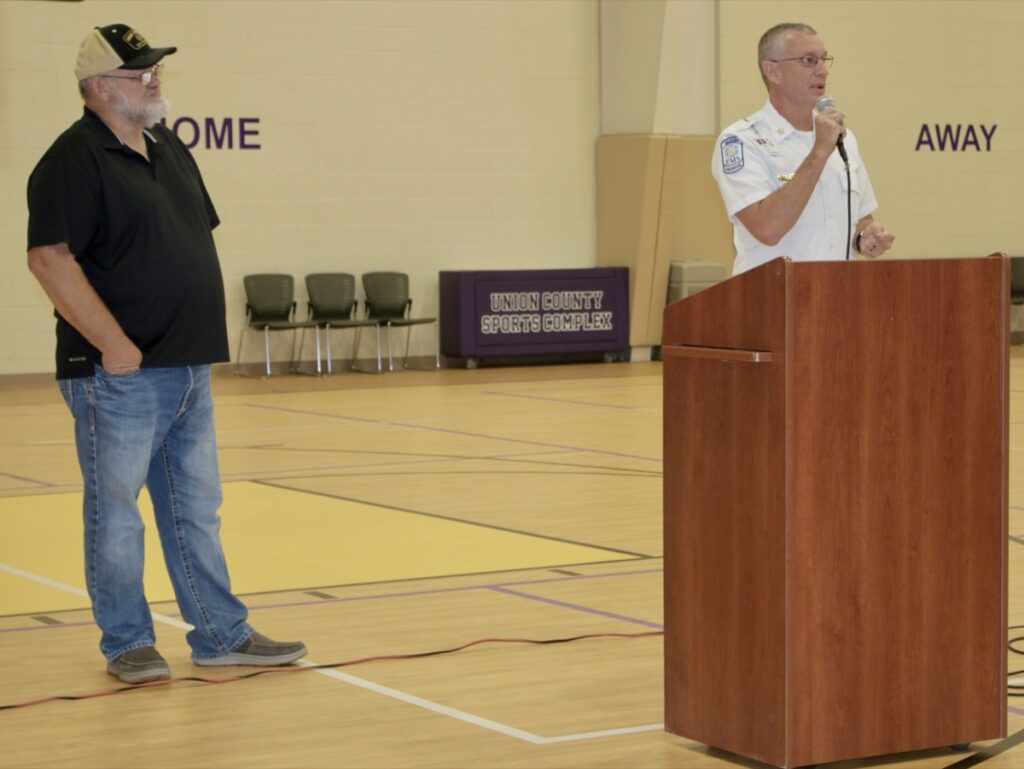 Sole Commissioner Harold Collins looking on as Fire Chief David Dyer explained one of several agenda items related to public safety during the Sept. 22 county meeting. Photo by Brittany Holbrooks