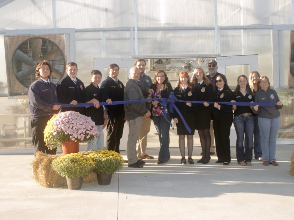 Students with Union County Future Farmers of America are grateful for the many new educational opportunities they will receive thanks to the installation of a new greenhouse at the Agriscience Center. Photo by Brittany Holbrooks