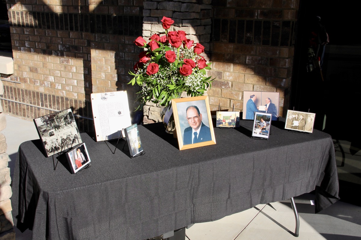Hughes Chatham was a dedicated public servant who served as the first 911 Director of Union County. The 911 Center set up this memorial table at the ribbon cutting to honor his lifelong commitment to public safety. Photo by Shawn Jarrard