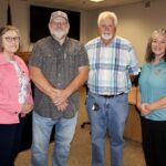 (L-) County Finance Director Kay Wilcox, Commissioner Harold Collins, Tax Commissioner Lee Knight and Deputy Tax Commissioner Jennifer Kerr. Photo by Shawn Jarrard