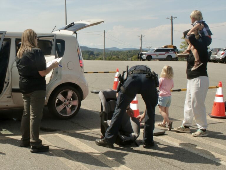 Parents were incredibly grateful for the opportunity to check on their children’s safety during the public Child Safety Seat Check last month. Photo by Brittany Holbrooks