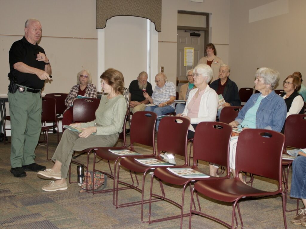 UCSO Sgt. Bob Calamari enjoys educating the public about scams – and it appears to be working, given the year over year decline in scammed residents. Photo by Brittany Holbrooks