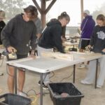 Young Harris College student athletes had a great time volunteering to build beds with Sleep in Heavenly Peace Oct. 8. Photo by Brittany Holbrooks